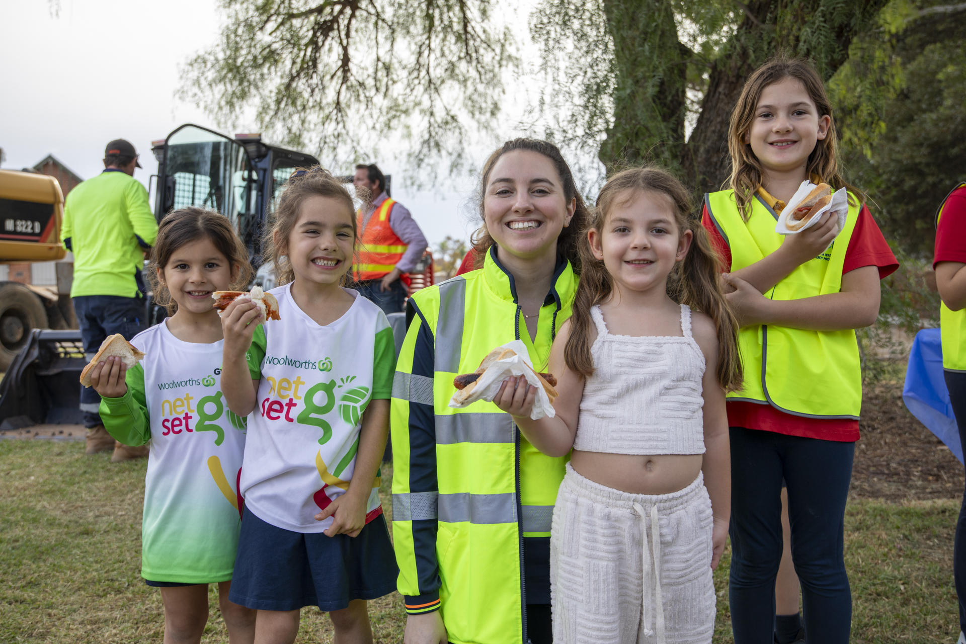 Happy Nichols Point Primary School students enjoying a sausage sizzle at the Meet the team event 